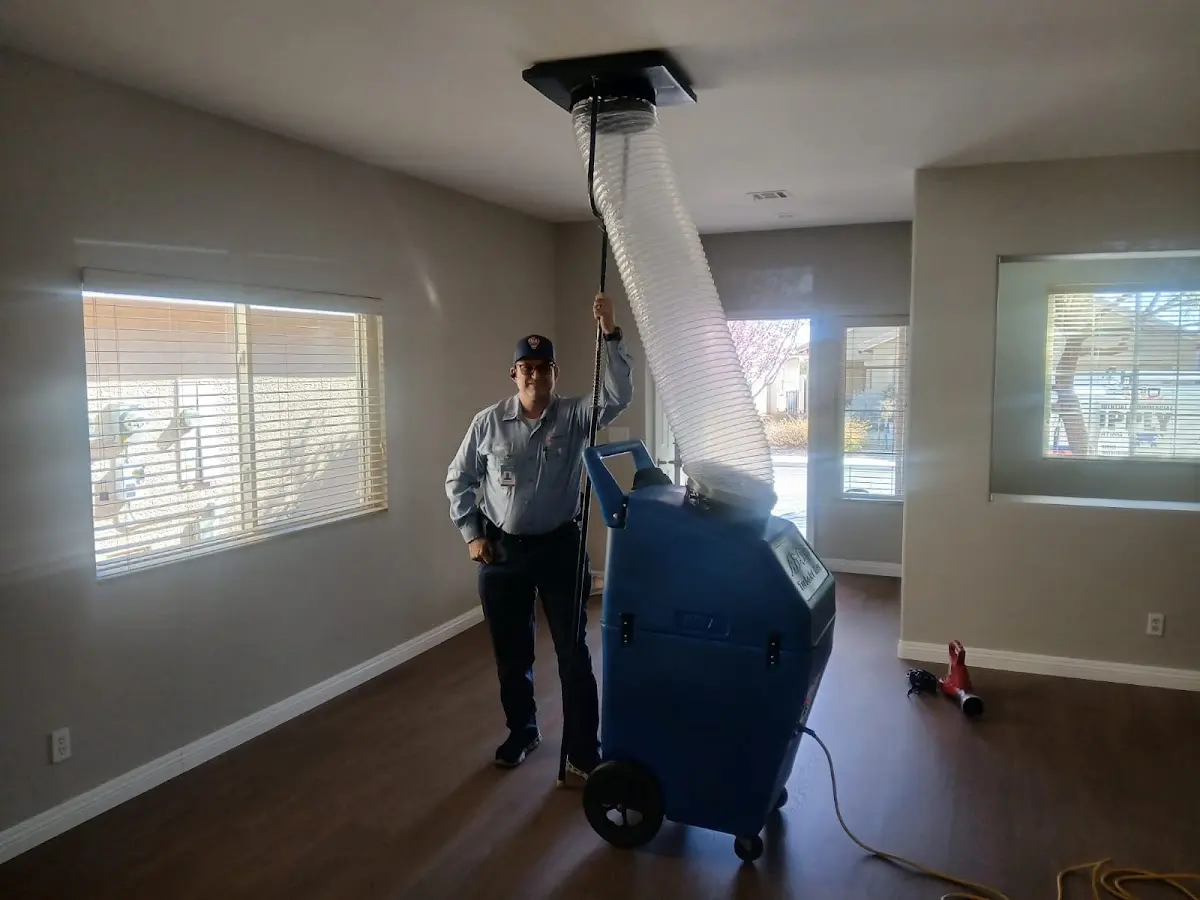 Professional Dryer Vent Cleaning work inside a Dent home